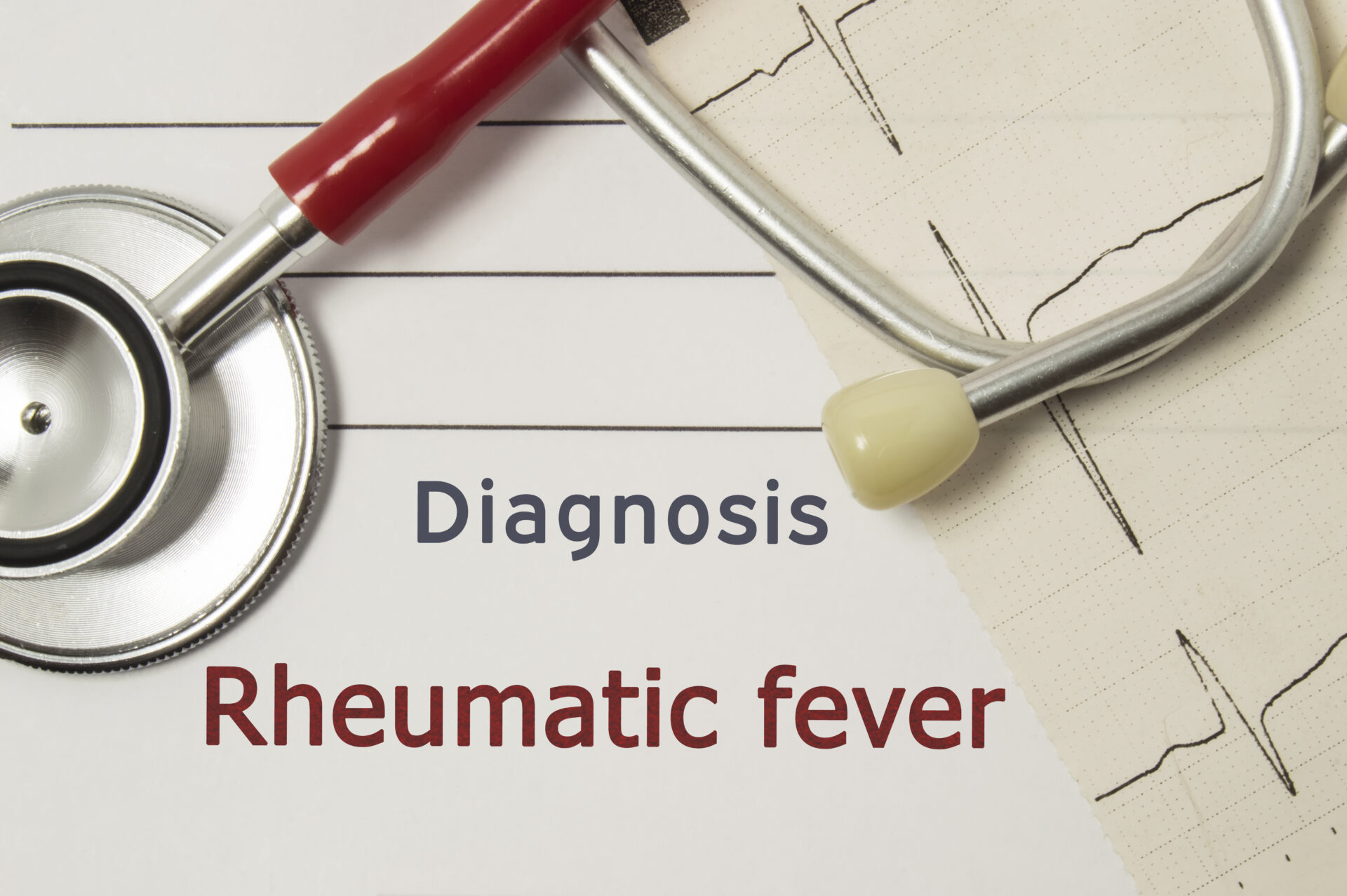 a stethoscope on a table showcasing rheumatic fever